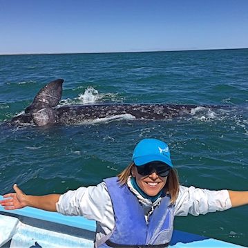 whale tail nautistyles smiling girl whale watching