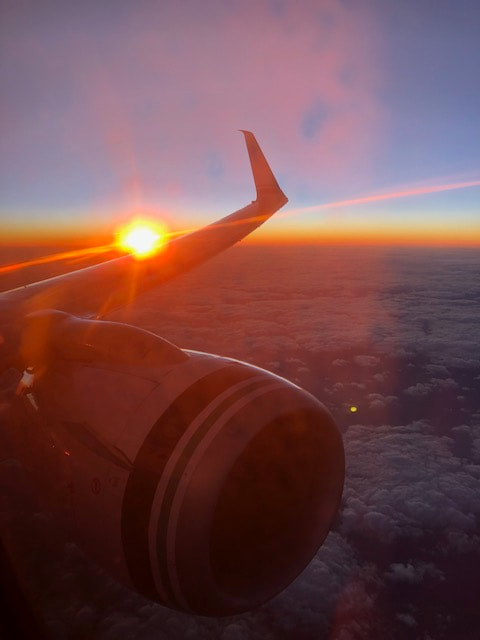 Nautistyles window plane sunset sky clouds